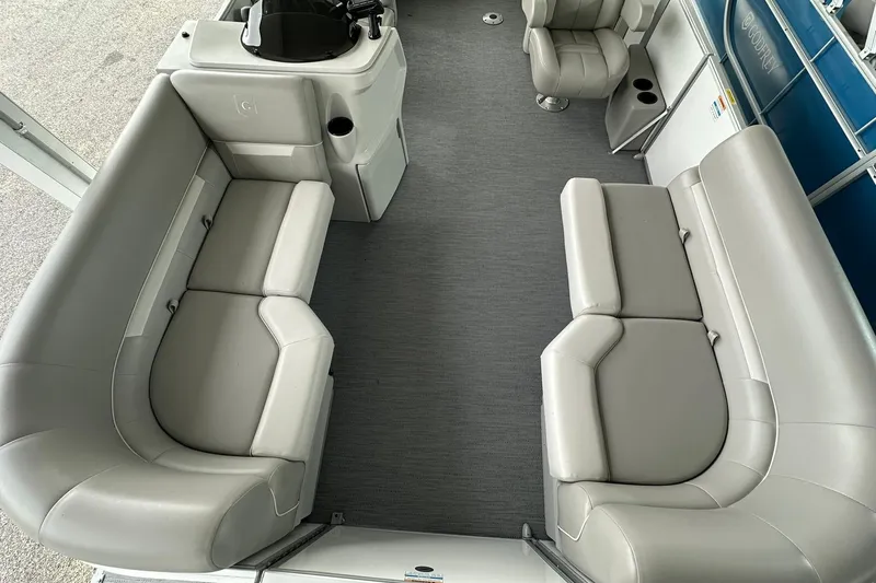 Slide: The Image of Interior of 2026 Sweetwater EX2086S pontoon boat with gray seating and helm station. - 5