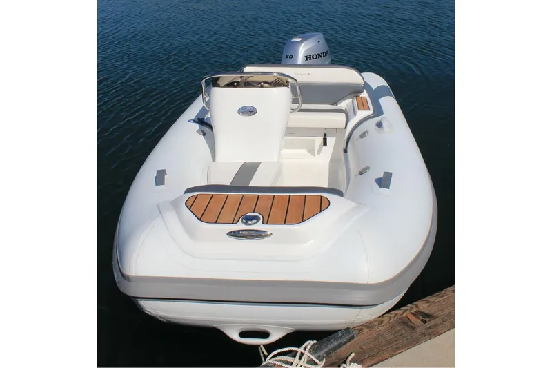 Slide: The Image of Manufacturer Provided Image: 2025 Walker Bay Generation 360 DLX boat on water, rear view. - 5