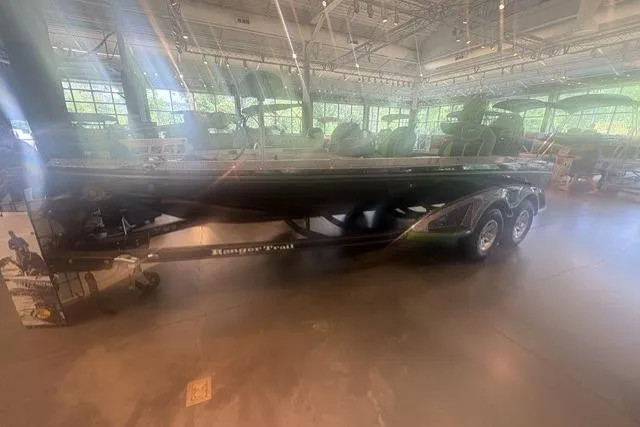 The Image of 2026 Ranger Z519R boat on display in a showroom with natural lighting. - 0
