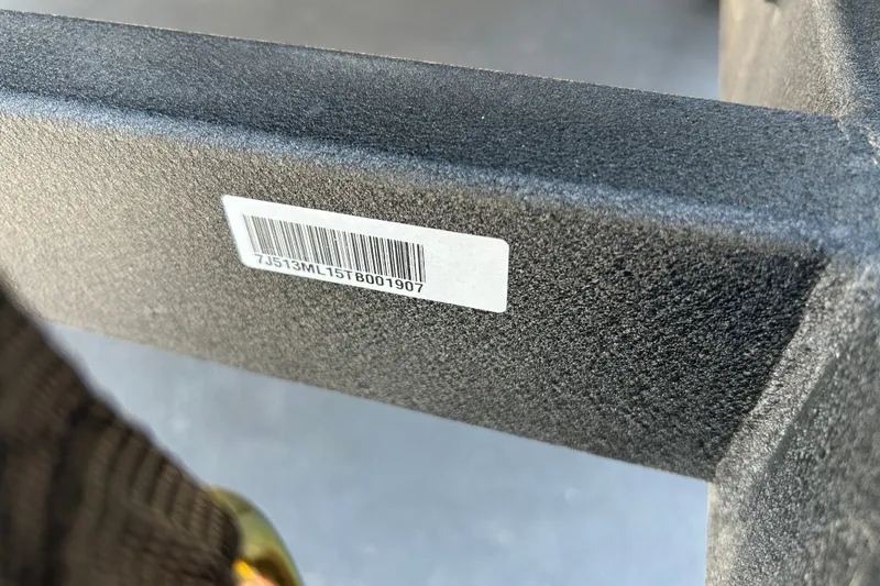 Slide: The Image of Close-up of a barcode on a 2026 Sun Tracker Party Barge 18 DLX. - 94