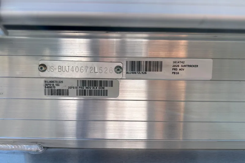 Slide: The Image of 2026 Sun Tracker Party Barge 18 DLX identification plate with serial number and barcode. - 92
