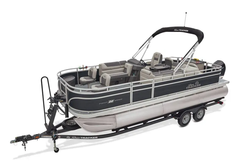 Slide: The Image of 2026 Sun Tracker Fishin' Barge 22 XP3 interior with seating and steering console. - 7