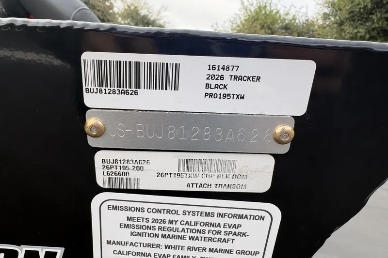 Slide: The Image of 2026 Tracker Pro Team 195 boat identification labels and emissions information. - 75