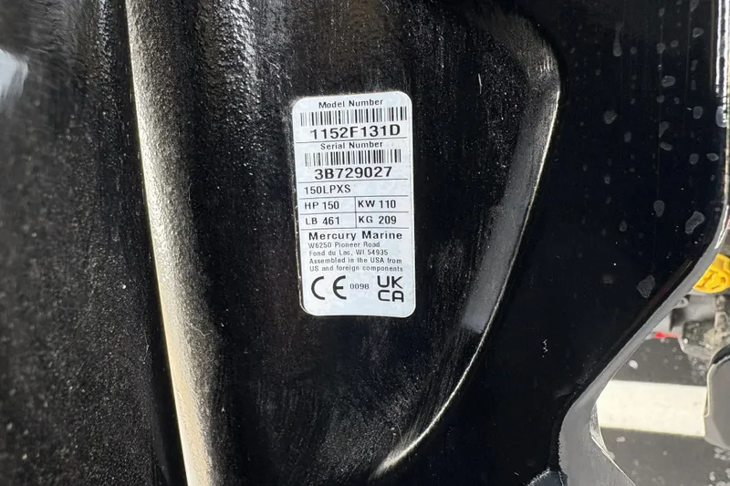 Slide: The Image of Label on a 2026 Tracker Pro Team 195 boat, displaying model and serial numbers. - 76