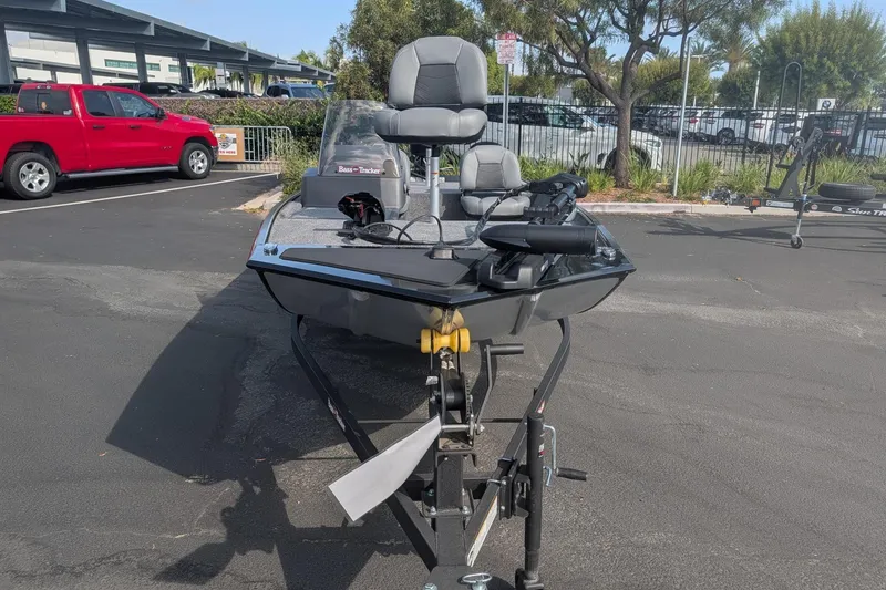 Slide: The Image of 2026 Tracker Bass Tracker Classic XL boat on trailer in parking lot. - 4