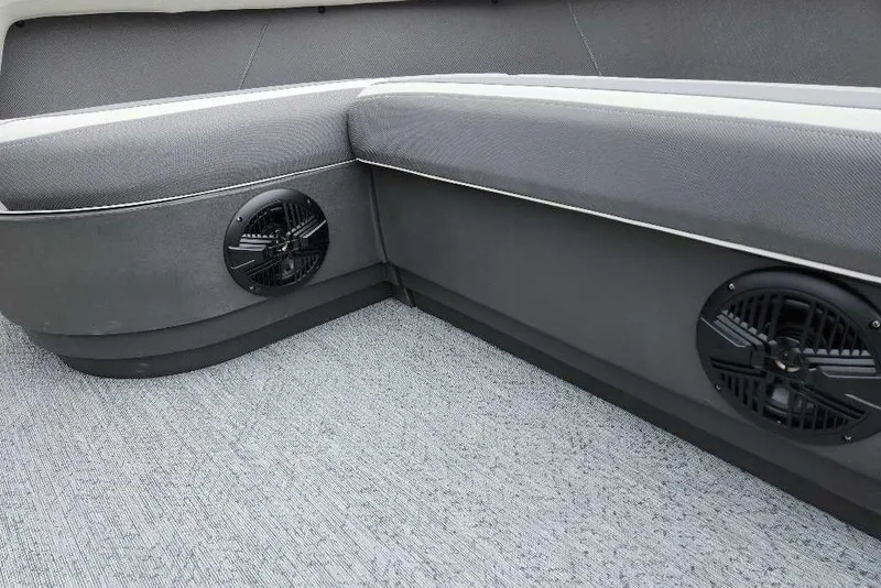 Slide: The Image of Interior seating of 2026 Sun Tracker Bass Buggy 16 XL Select with built-in speakers. - 82