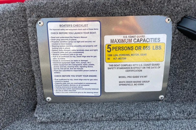 Slide: The Image of Boater's checklist and capacity plate on 2026 Tracker Pro Guide V-16 WT boat. - 28