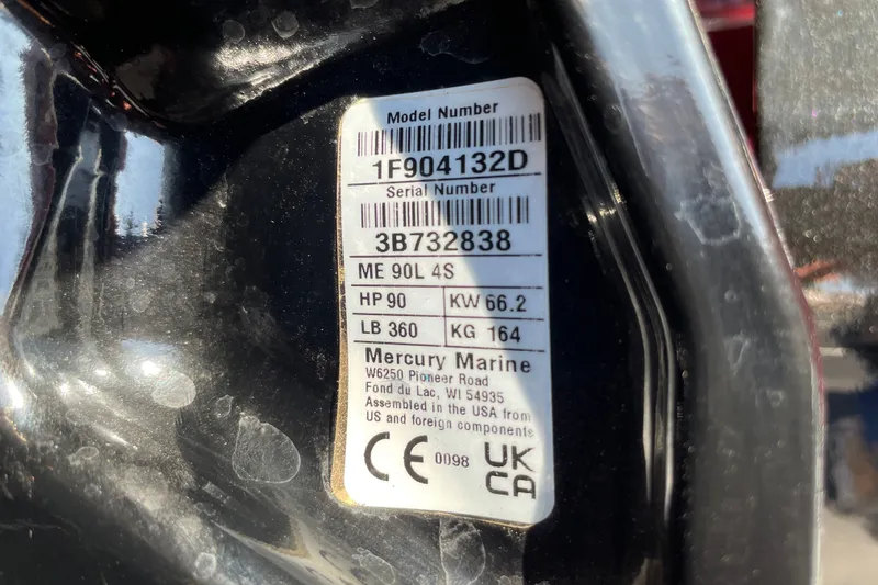 Slide: The Image of Label on a 2026 Tracker Pro Guide V-16 WT, displaying model and serial numbers. - 27