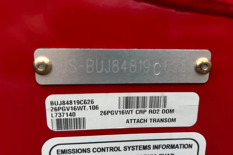Slide: The Image of 2026 Tracker Pro Guide V-16 WT boat identification and emissions control labels. - 69