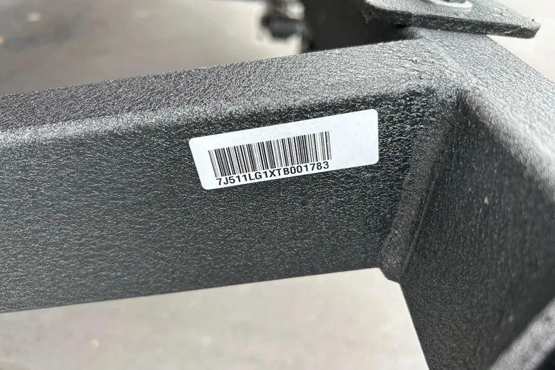 Slide: The Image of Barcode on Tracker Pro Guide V-16 WT 2026 boat frame, close-up view. - 71