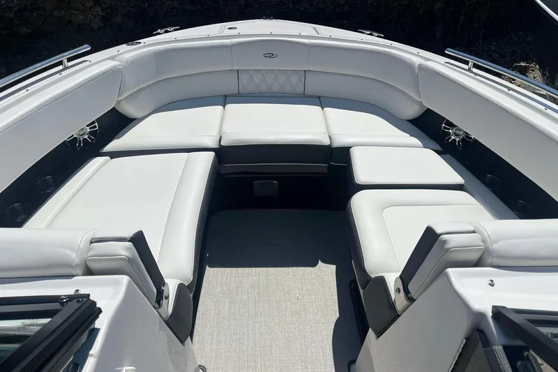 Slide: The Image of 2023 Regal 2800 Bowrider interior with spacious white seating and modern design. - 17