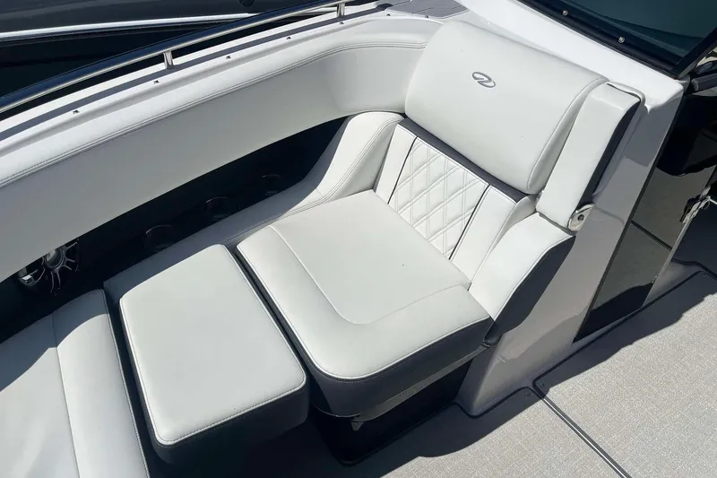 Slide: The Image of 2023 Regal 2800 Bowrider interior with luxurious white seating and elegant design. - 19