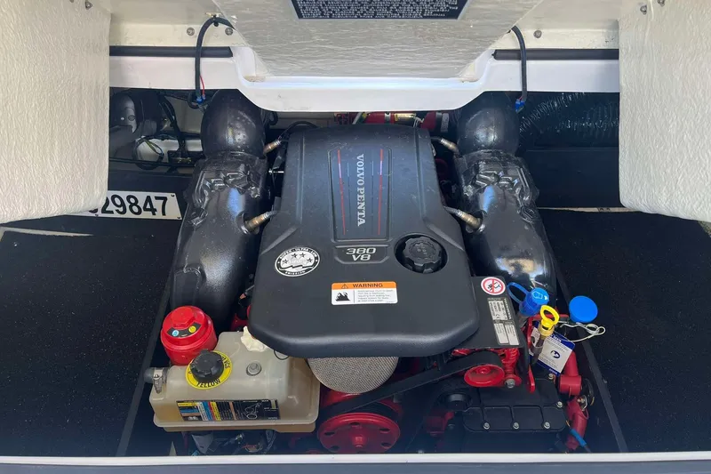 Slide: The Image of Volvo Penta engine in 2023 Regal 2800 Bowrider boat, showcasing powerful V8 design. - 23
