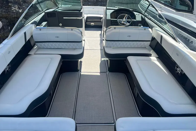 Slide: The Image of 2023 Regal 2800 Bowrider interior with luxurious seating and modern design. - 8