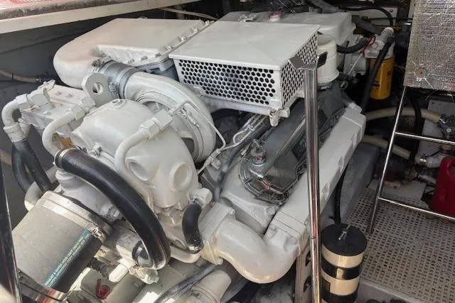 Slide: The Image of Engine compartment of a 1992 Tiara Yachts 3600 Open, showcasing mechanical components. - 16