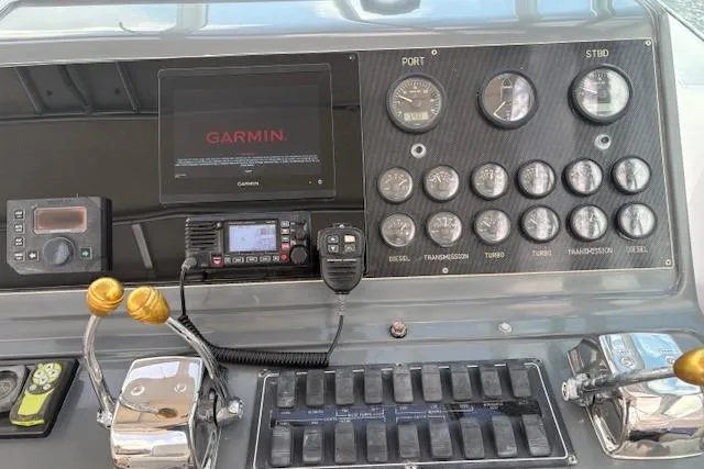 Slide: The Image of Control panel of a 1992 Tiara Yachts 3600 Open with Garmin navigation system. - 9