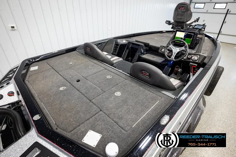 Slide: The Image of 2023 Ranger Z519 boat interior with advanced navigation system and spacious seating. - 11