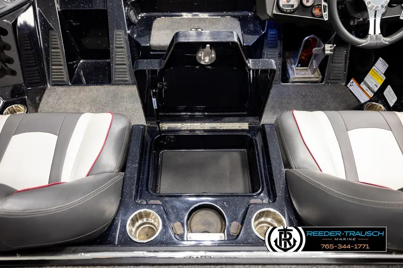 Slide: The Image of 2023 Ranger Z519 boat interior with dual seats, storage compartment, and cup holders. - 20