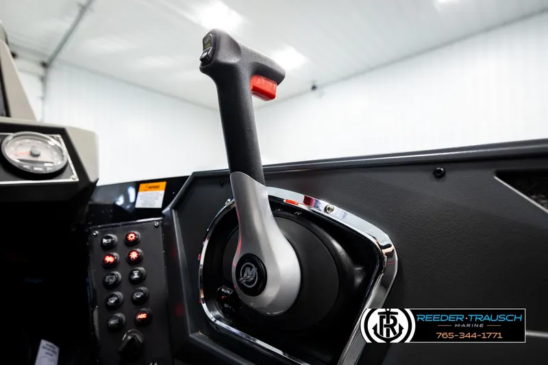 Slide: The Image of 2023 Ranger Z519 boat throttle control in a modern cockpit setting. - 35