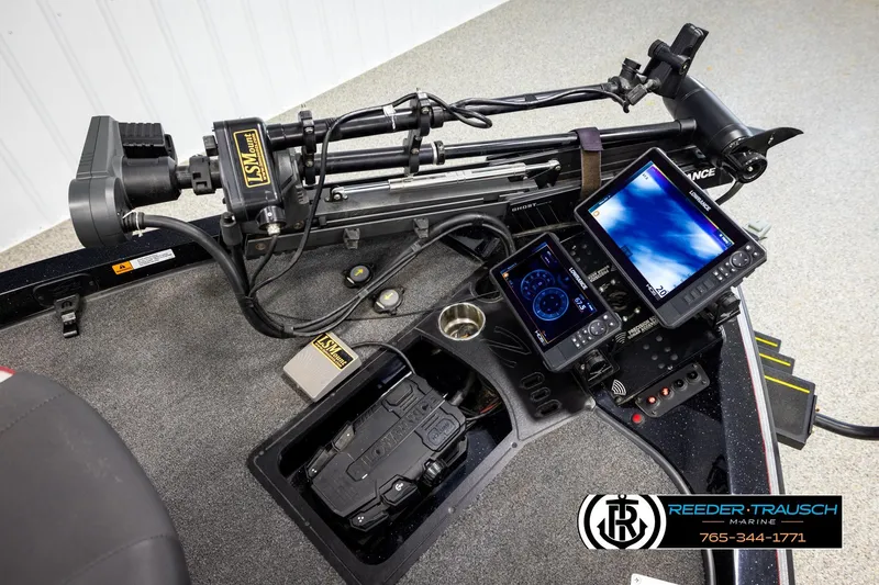 Slide: The Image of 2023 Ranger Z519 boat dashboard with advanced navigation and control systems. - 42