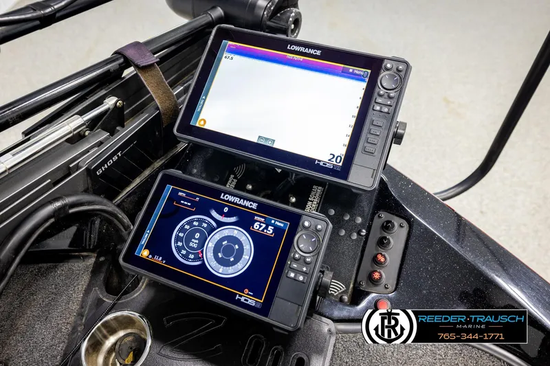 Slide: The Image of 2023 Ranger Z519 boat dashboard with Lowrance HDS displays and Ghost trolling motor. - 44