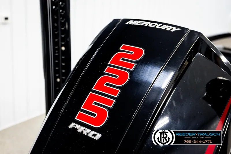 Slide: The Image of 2023 Ranger Z519 boat with Mercury Pro engine, featuring bold red and white graphics. - 50