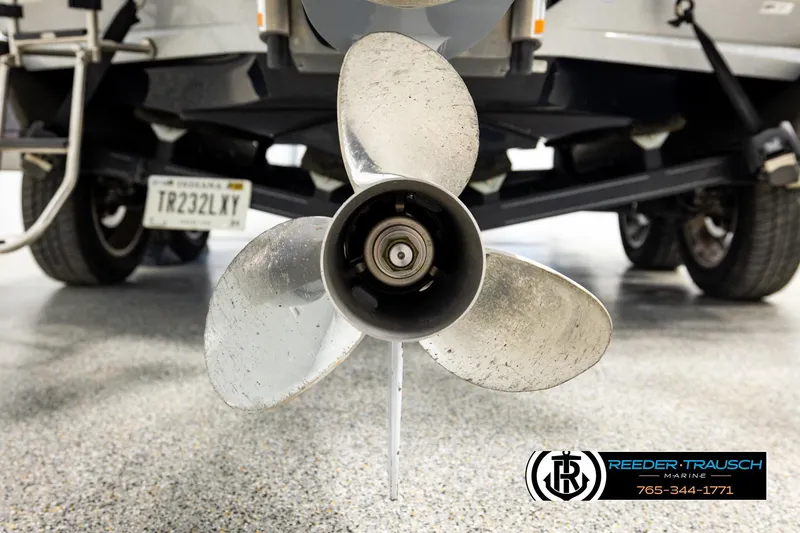 Slide: The Image of 2023 Ranger Z519 boat propeller close-up with trailer and license plate visible. - 51