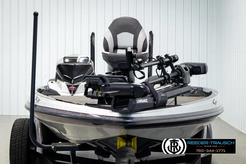 Slide: The Image of 2023 Ranger Z519 boat with Lowrance equipment, displayed at Reeder-Trausch Marine showroom. - 7