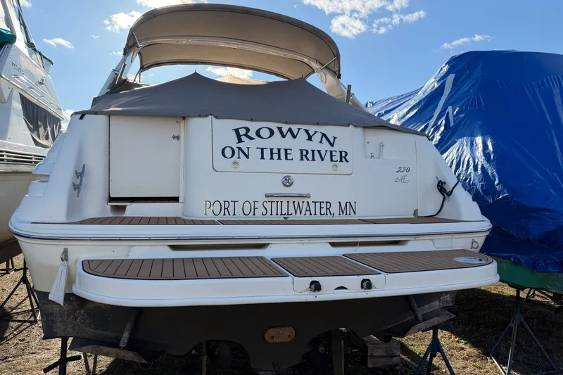 Slide: The Image of 1997 Sea Ray Sundancer 330 boat docked, named "Rowyn on the River," Port of Stillwater, MN. - 4