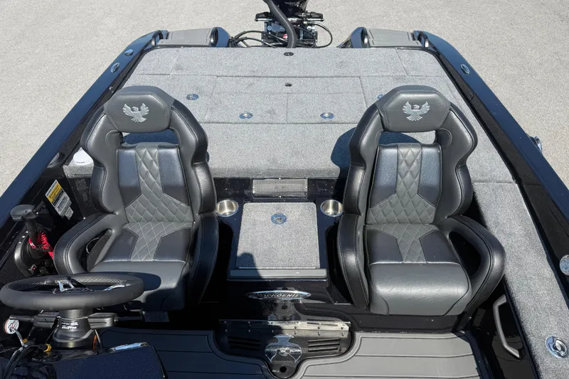Slide: The Image of 2026 Phoenix 921 Elite X boat interior with dual black leather seats. - 15
