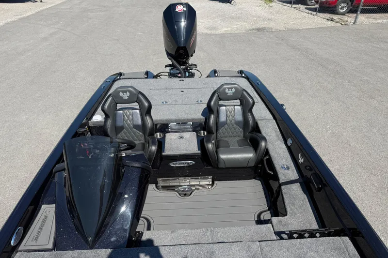 Slide: The Image of 2026 Phoenix 921 Elite X boat interior with dual seats and sleek design. - 16