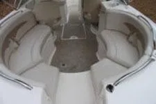 Slide: The Image of 2002 Chaparral Sunesta 263 boat interior with spacious seating arrangement. - 10