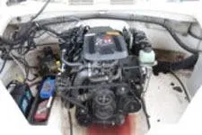 Slide: The Image of Engine compartment of a 2002 Chaparral Sunesta 263 boat. - 16