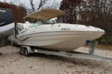 Slide: The Image of 2002 Chaparral Sunesta 263 boat on trailer, parked outdoors. - 4