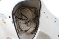 Slide: The Image of Storage compartment of 2002 Chaparral Sunesta 263 boat with fabric inside. - 9