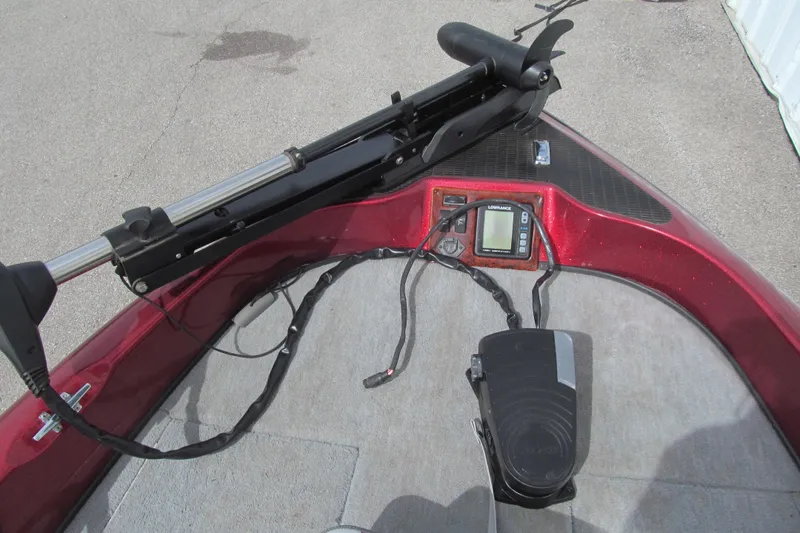 Slide: The Image of Triton SF-21 boat dashboard with trolling motor and fish finder, 2000 model. - 10