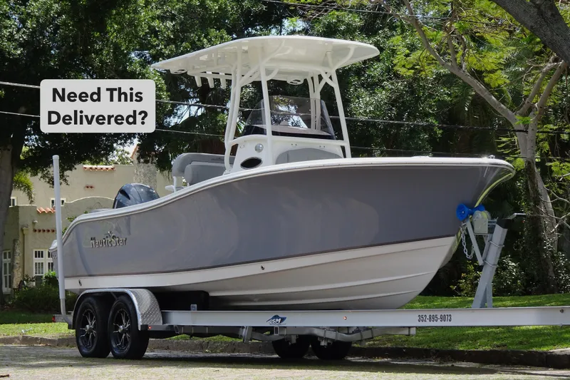 Slide: The Image of 2022 NauticStar 2302 Legacy boat on trailer, ready for delivery. - 2