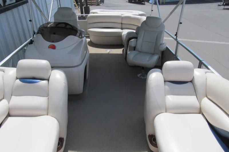 Slide: The Image of 2008 Sun Tracker Party Barge 25 Regency Edition with luxurious seating and helm. - 10