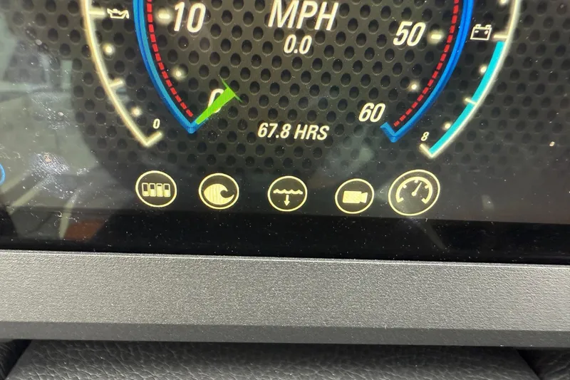 Slide: The Image of Dashboard of 2021 Malibu Wakesetter 21 VLX showing speedometer and icons. - 21