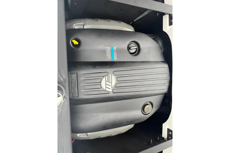 Slide: The Image of Engine compartment of a 2021 Malibu Wakesetter 21 VLX boat. - 23