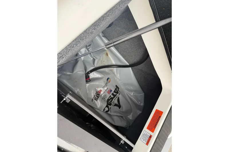 Slide: The Image of 2021 Malibu Wakesetter 21 VLX ballast compartment with FatSac ballast bag. - 24