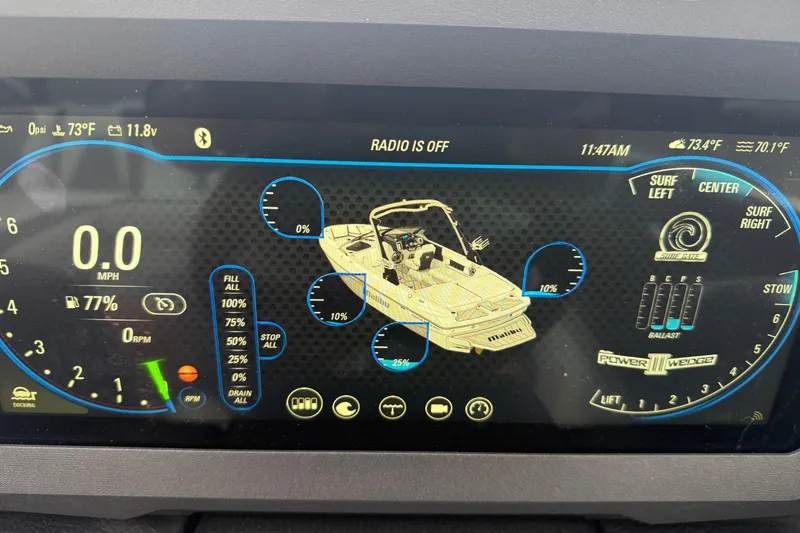 Slide: The Image of Dashboard display of a 2021 Malibu Wakesetter 21 VLX boat, showing speed and ballast settings. - 25