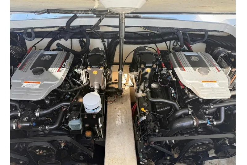 Slide: The Image of Twin engines in a 2008 Formula 310 Sun Sport boat engine compartment. - 18