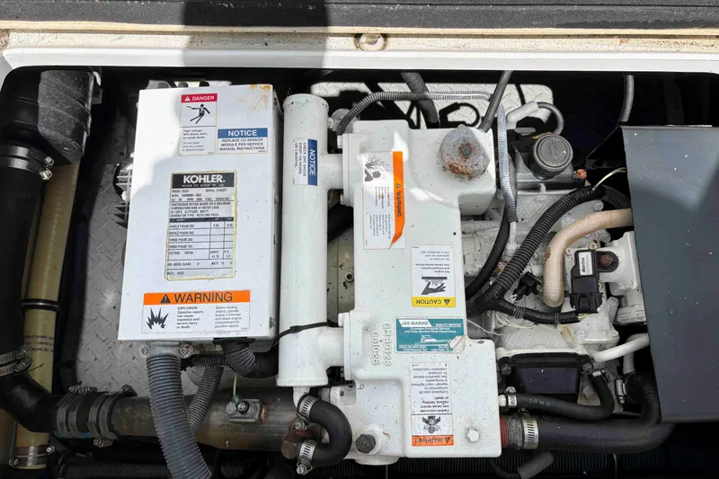 Slide: The Image of Engine compartment of a 2008 Formula 310 Sun Sport boat with Kohler generator. - 19