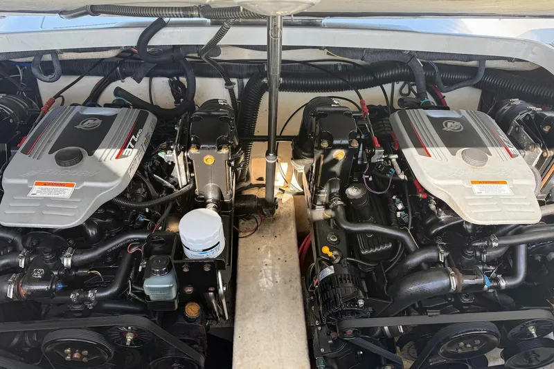 Slide: The Image of Twin engines in a 2008 Formula 310 Sun Sport boat engine compartment. - 7