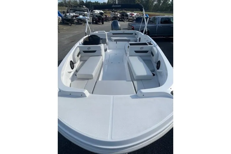 Slide: The Image of 2023 Hurricane SunDeck Sport 185 OB boat with spacious seating and sleek design. - 5