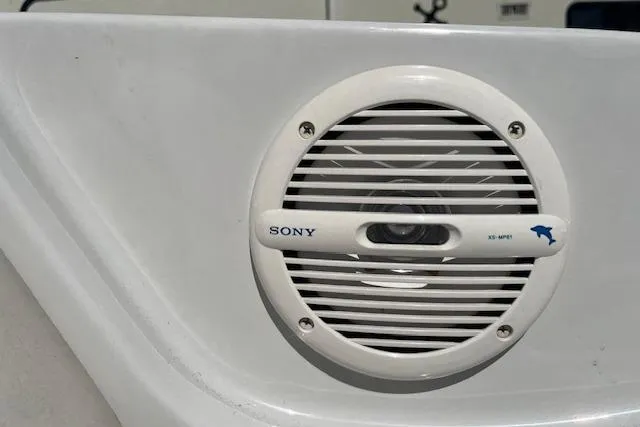 Slide: The Image of Sony marine speaker on 2005 Crownline 240 EX boat, white background. - 14