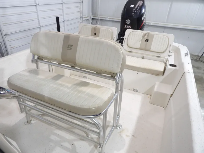 Slide: The Image of 2013 Carolina Skiff 238 DLV boat interior with helm console. - 14