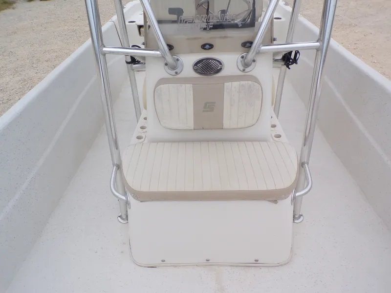 Slide: The Image of 2013 Carolina Skiff 238 DLV boat interior with seating area. - 19