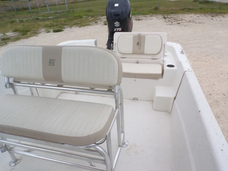 Slide: The Image of Interior of a 2013 Carolina Skiff 238 DLV with seating benches. - 21